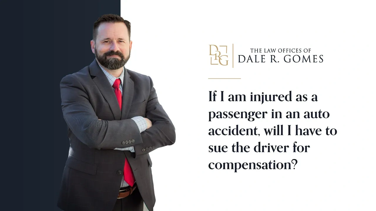 A man in a suit stands with folded arms next to text asking if an injured passenger in an auto accident must sue the driver for compensation, under The Law Offices of Dale R. Gomes logo.