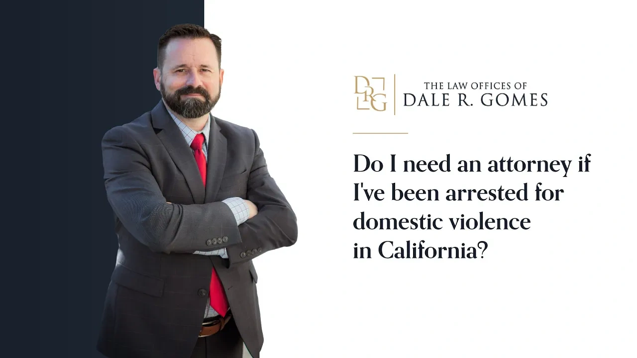 A man in a suit stands with arms crossed next to text that reads, "Do I need an attorney if I've been arrested for domestic violence in California?" and law office branding.